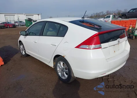 2011 Honda Insight Ex z USA, uszkodzony, nr VIN JHMZE2H74BS011529